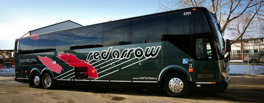 Sideview of a Red Arrow black motorcoach