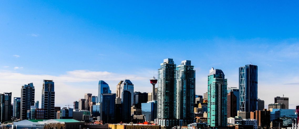 Calgary city skyline under blue sky during daytime